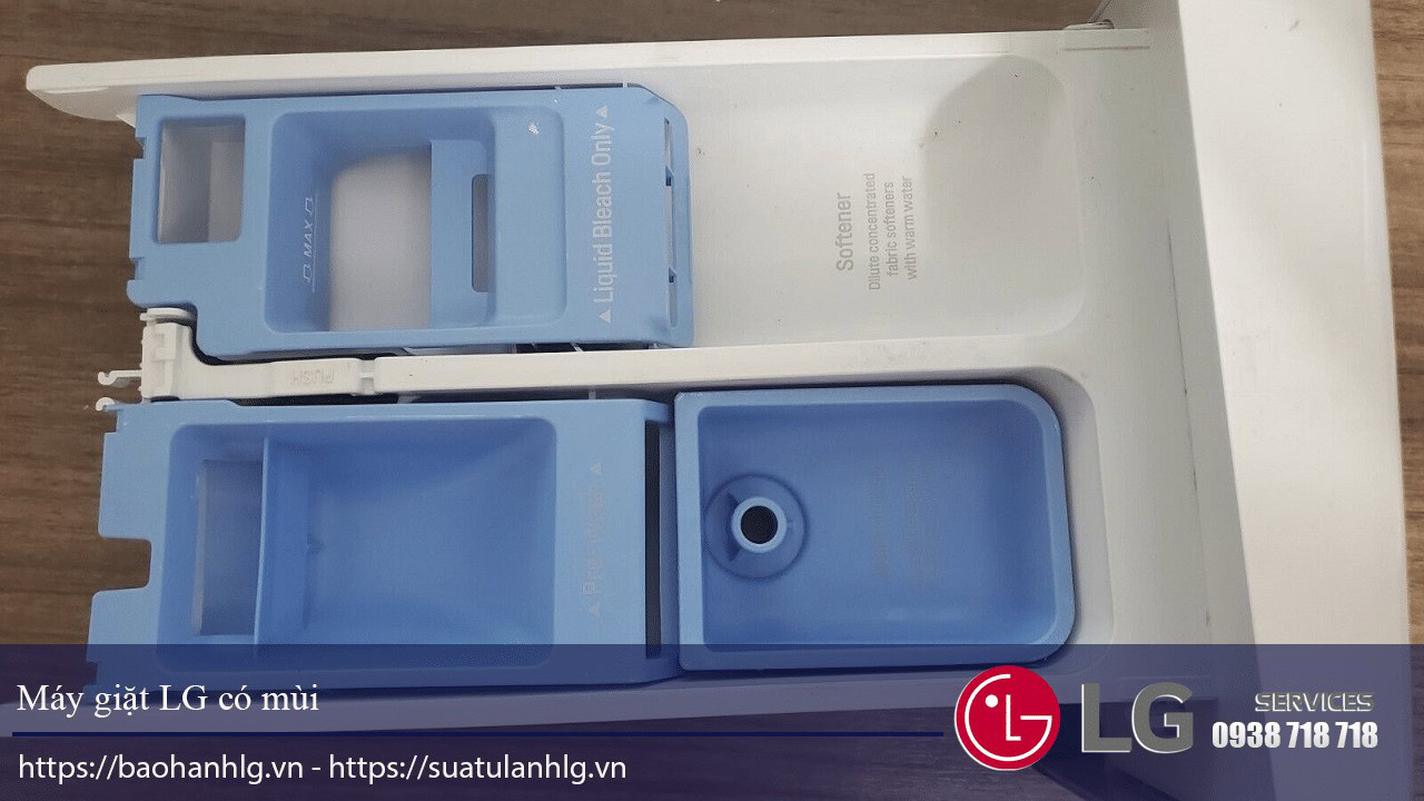 Blue LG washing machine tub compartment for maintenance and parts replacement.